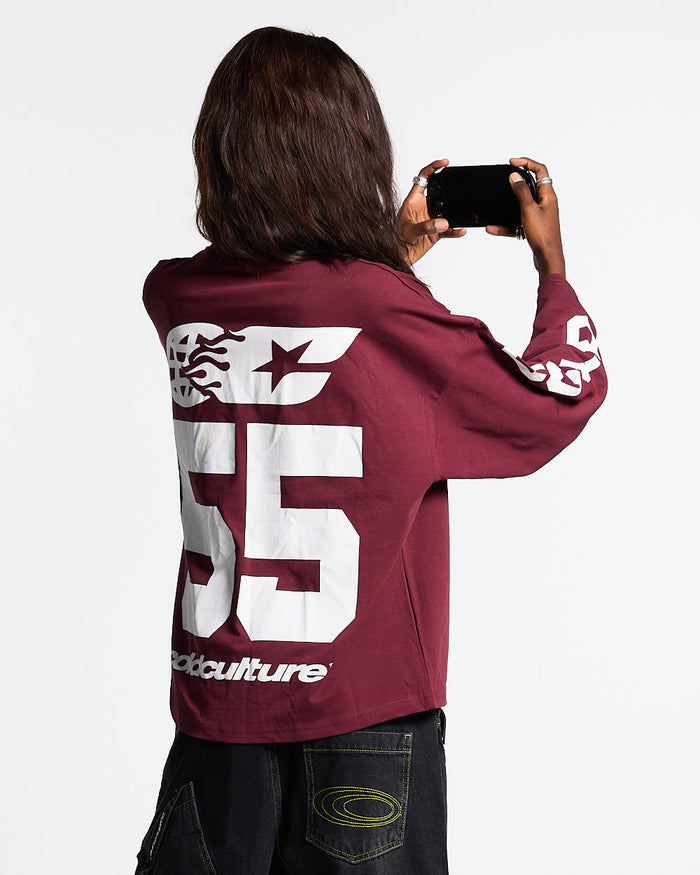 55 FLAMES LONGSLEEVE BURGUNDY - burgundy graphic longsleeve tee, back view on female model - Cold Culture #woman