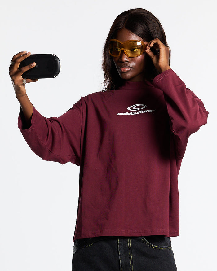 55 FLAMES LONGSLEEVE BURGUNDY - burgundy graphic longsleeve tee, front view on female model - Cold Culture #woman