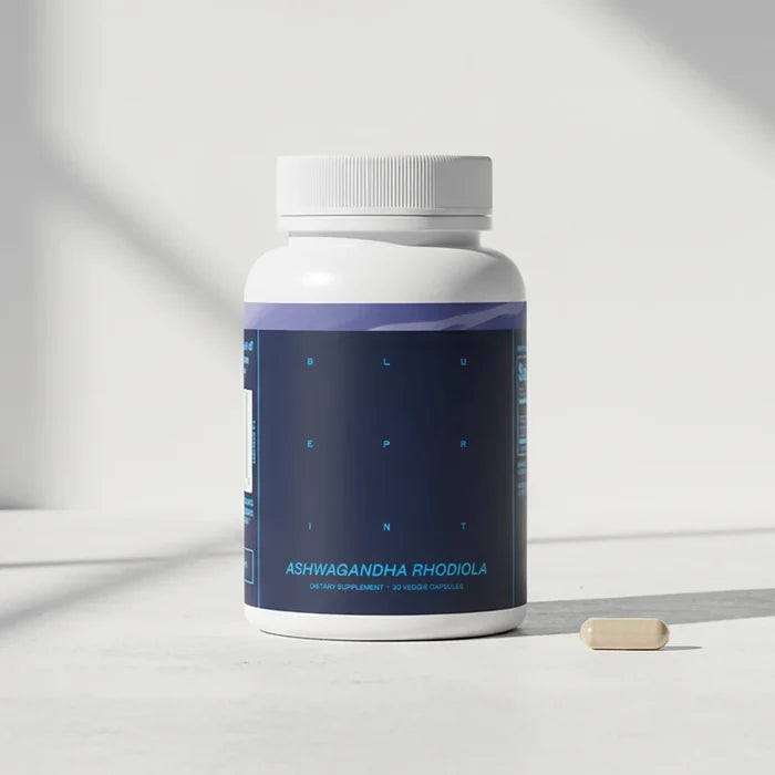 Supplement bottle labeled 'ASHWAGANDHA RHODIOLA' on a light background