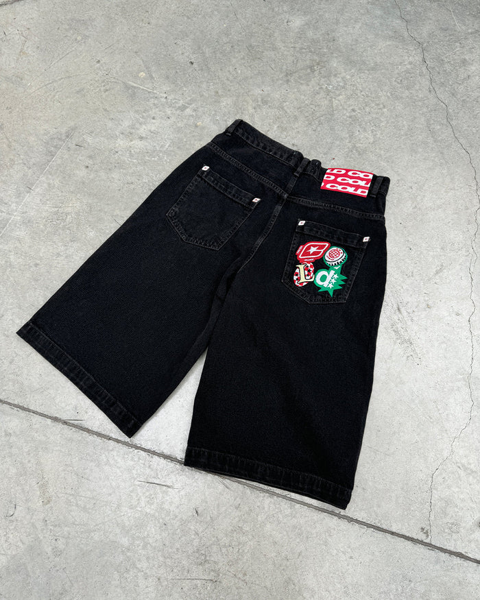 BADGES JORTS BLACK LICORICE - black baggy denim shorts, flat lay - Cold Culture