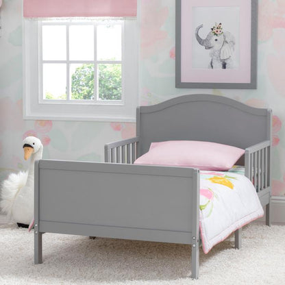 A gray Bennett Toddler Bed with guardrails on both sides, displayed in a room with a wall painting of an elephant and a swan.