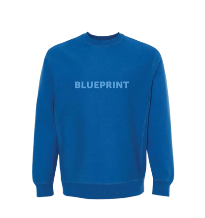 A blue crewneck sweatshirt with the word 'BLUEPRINT' printed across the front in capital letters
