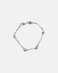 BONES BRACELET - silver bone link bracelet, flat lay - Cold Culture