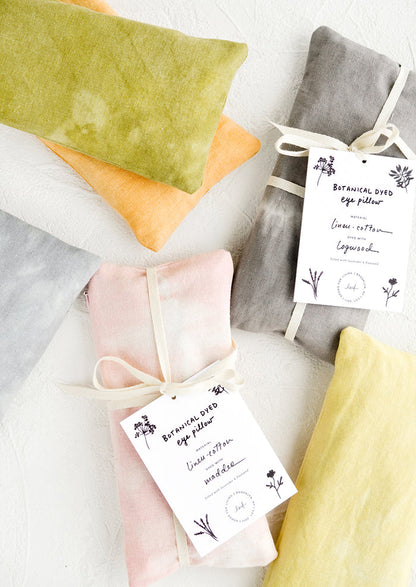 Rectangular eye pillows in naturally dyed fabrics and an assortment of colors.