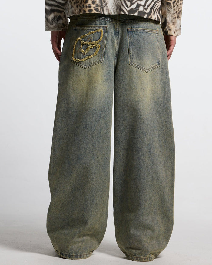 C V2 PANTS DIRTY LIGHT DENIM - light wash baggy denim pants, back view on male model - Cold Culture #man