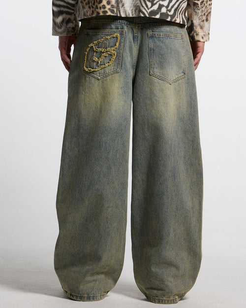 C V2 PANTS DIRTY LIGHT DENIM - light wash baggy denim pants, back view on male model - Cold Culture #man