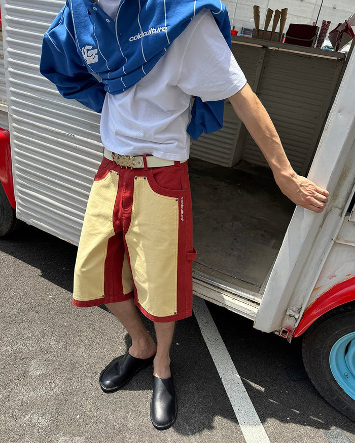 CARPENTER PANELS SHORTS BURGUNDY AND VANILLE - burgundy and cream carpenter shorts, street style shot - Cold Culture