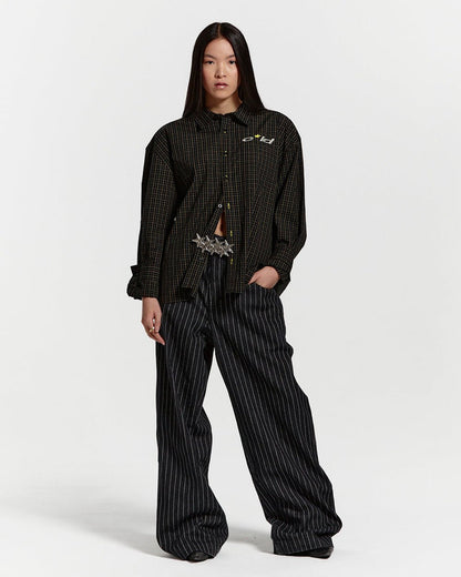 CASINO PANTS BLACK DENIM - black pinstripe denim pants, front view on female model - Cold Culture #woman