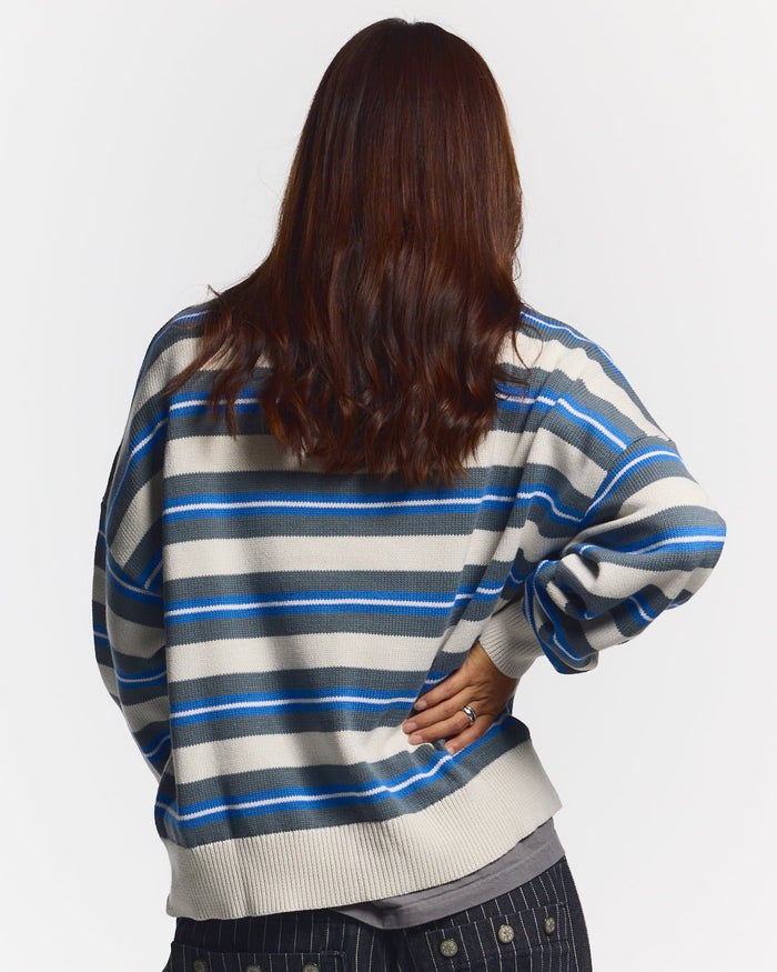 CASINO STRIPES KNIT WHITE MIST - white striped knit sweater, back view on female model - Cold Culture #woman