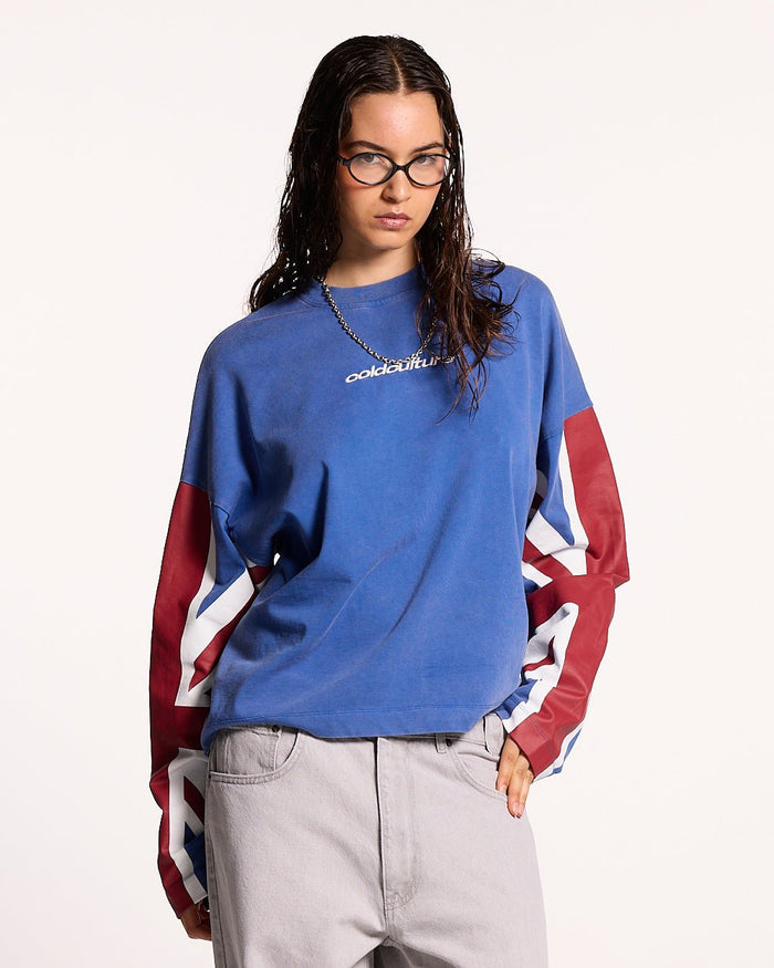 CHEERS LONGSLEEVE ROYAL - royal blue flag print longsleeve tee, front view on female model - Cold Culture #woman