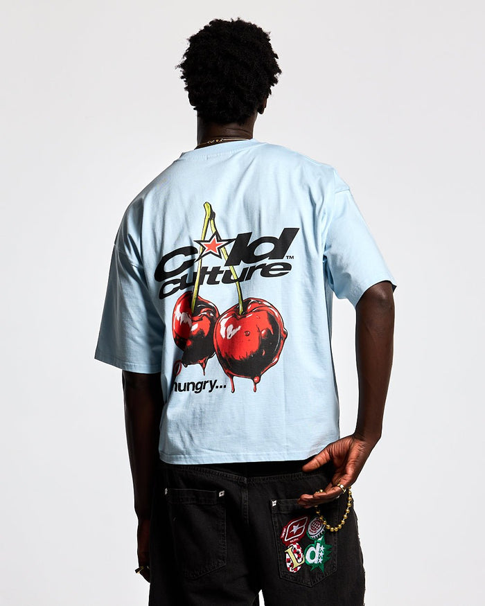 CHERRY TEE DREAM BLUE - light blue graphic print tee, back view on male model - Cold Culture #man