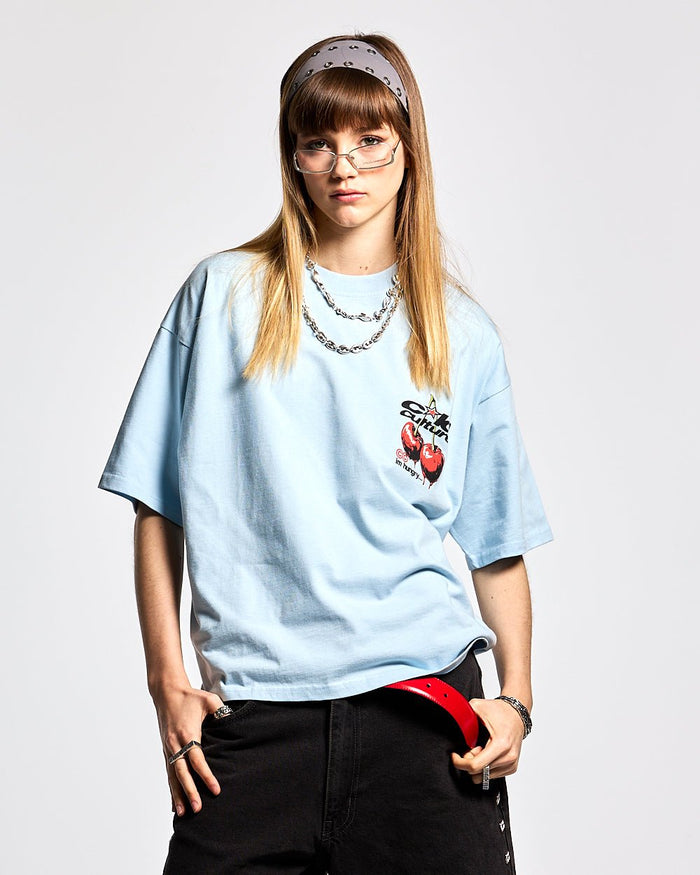 CHERRY TEE DREAM BLUE - light blue graphic print tee, front view on female model - Cold Culture #woman