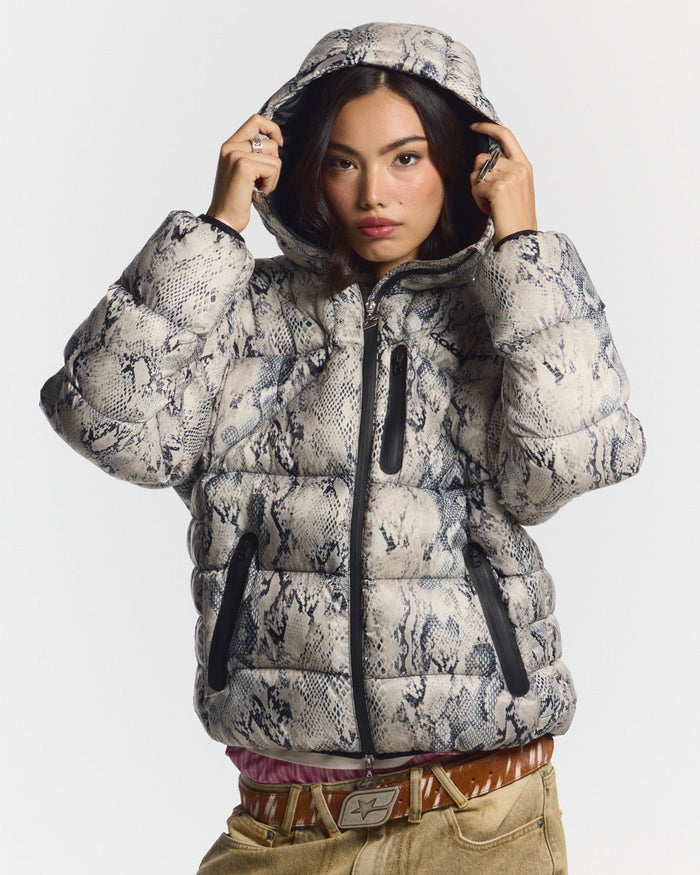 CLOUD ARMOR PUFFER SNAKE - snake print puffer jacket, front view on female model - Cold Culture #woman