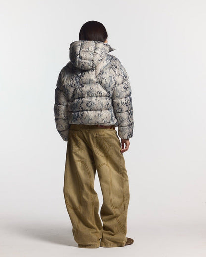 CLOUD ARMOR PUFFER SNAKE - snake print puffer jacket, back view on female model - Cold Culture #woman