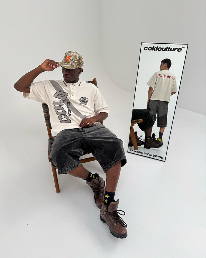 COCKY POLO GREY - grey graphic print polo shirt, front view on male model - Cold Culture