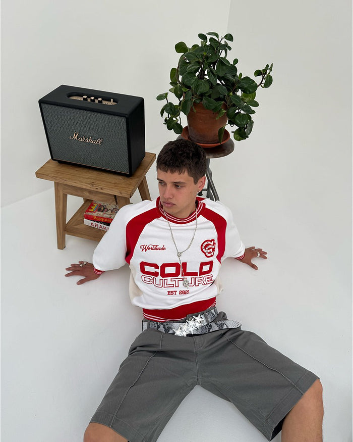 COWBOY VARSITY CREWNECK FIERY RED - red and white varsity crewneck, front view on male model - Cold Culture