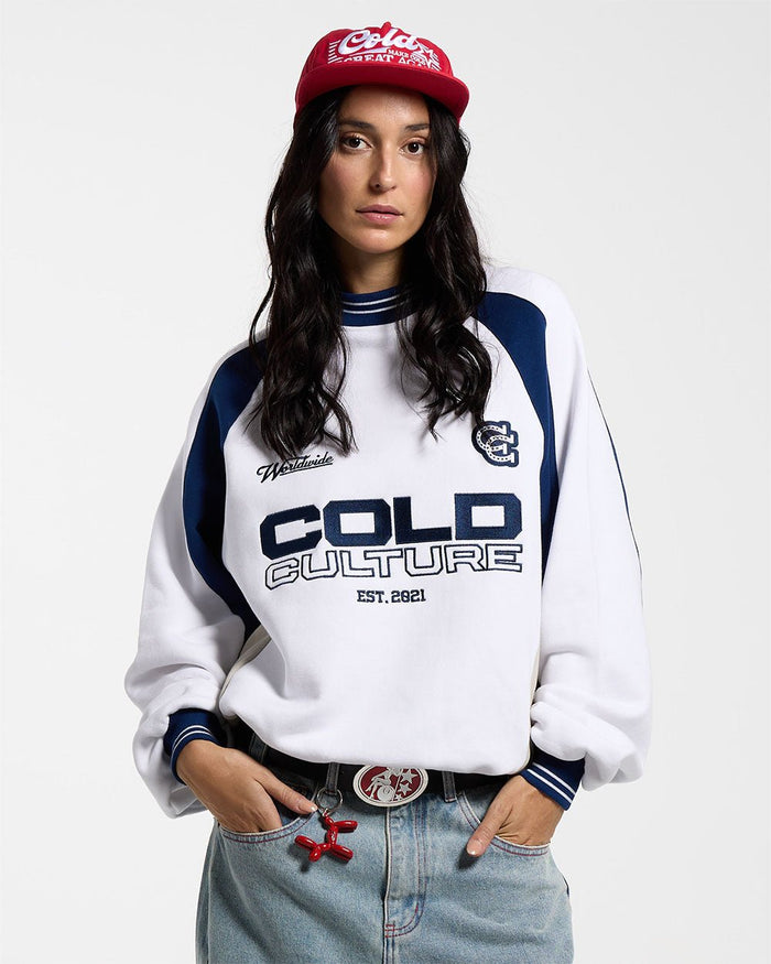 COWBOY VARSITY CREWNECK WHITE/BLUE - white and navy varsity crewneck sweatshirt, front view on female model - Cold Culture #woman
