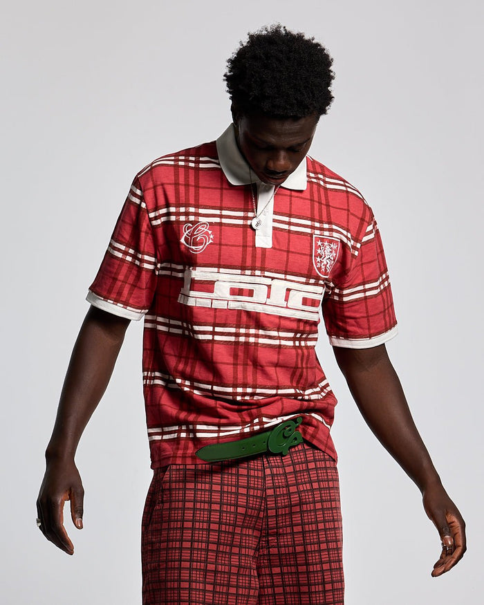 CRIMSON PLAID POLO TEE - red plaid polo shirt, front view on male model - Cold Culture #man