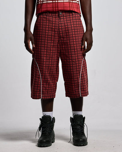 CRIMSON PLAID SUIT JORTS - red plaid shorts, front view on male model - Cold Culture #man
