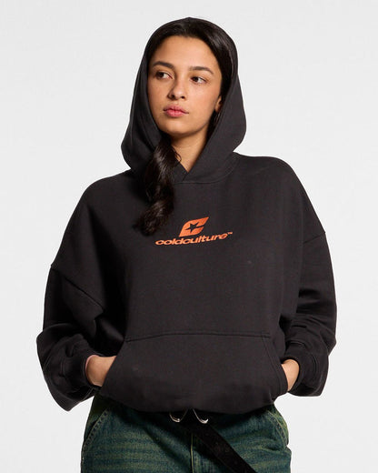 CURVED HOODIE BLACK - black logo print hoodie, front view on female model - Cold Culture #woman