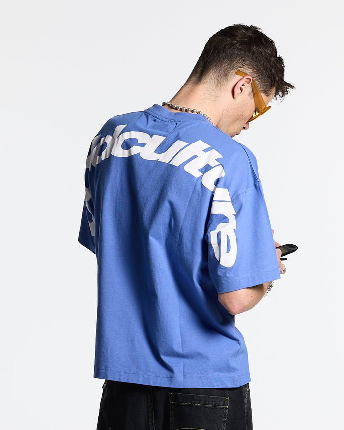 CURVED TEE AMPARO BLUE - blue oversized tee, back view on male model - Cold Culture #man
