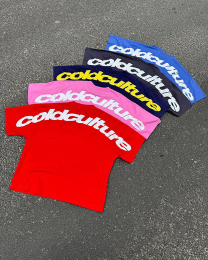 CURVED TEE RACING RED - red oversized tee, flat lay with matching pieces - Cold Culture