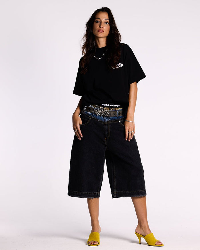 DARK SEA SHORT - baggy black denim shorts, front view on female model - Cold Culture #woman