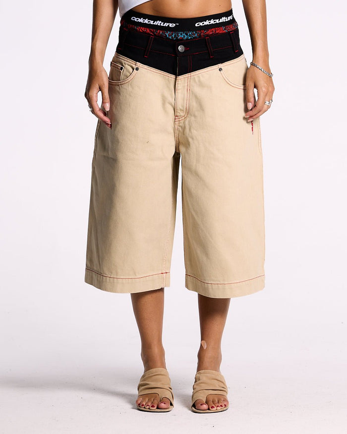 DESERT SHORT - baggy beige denim shorts, front view on female model - Cold Culture #woman