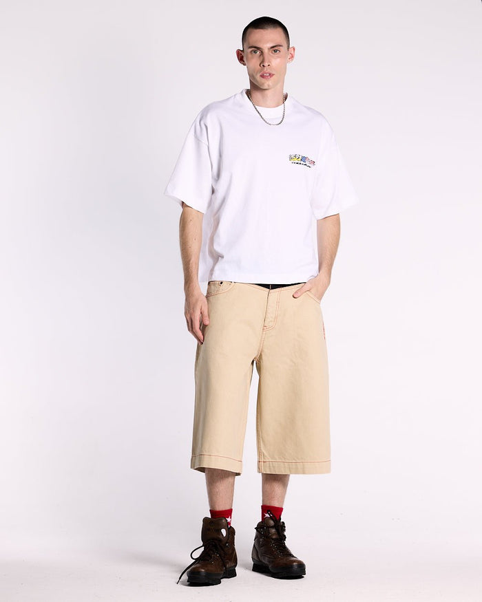 DESERT SHORT - baggy beige denim shorts, front view on male model - Cold Culture #man