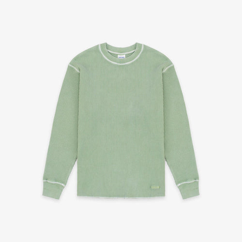A sage green ribbed knit long-sleeve shirt with contrasting light green trim along the crew neck, shoulders, cuffs, and hem, displayed flat against a light gray background.