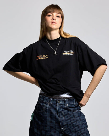 DYNAMIC TEE BLACK AND ORANGE - black graphic print tee, front view on female model - Cold Culture #woman