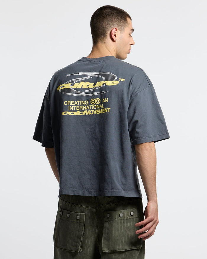 DYNAMIC TEE DARK BLUE - dark blue oversized graphic tee, back view on male model - Cold Culture #man