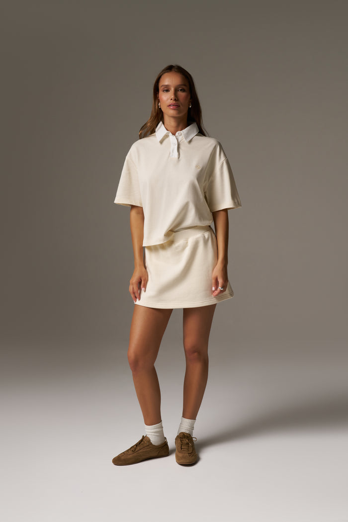 EMBLEM JERSEY SKORT - BUTTERMILK