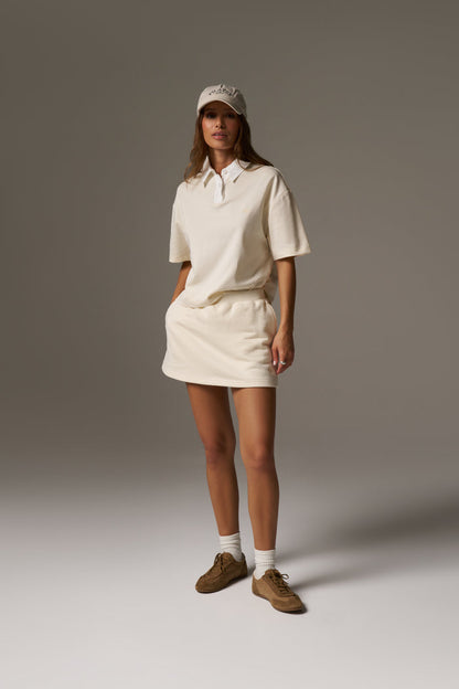 EMBLEM POLO TEE - BUTTERMILK