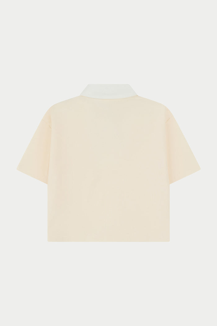 EMBLEM POLO TEE - BUTTERMILK