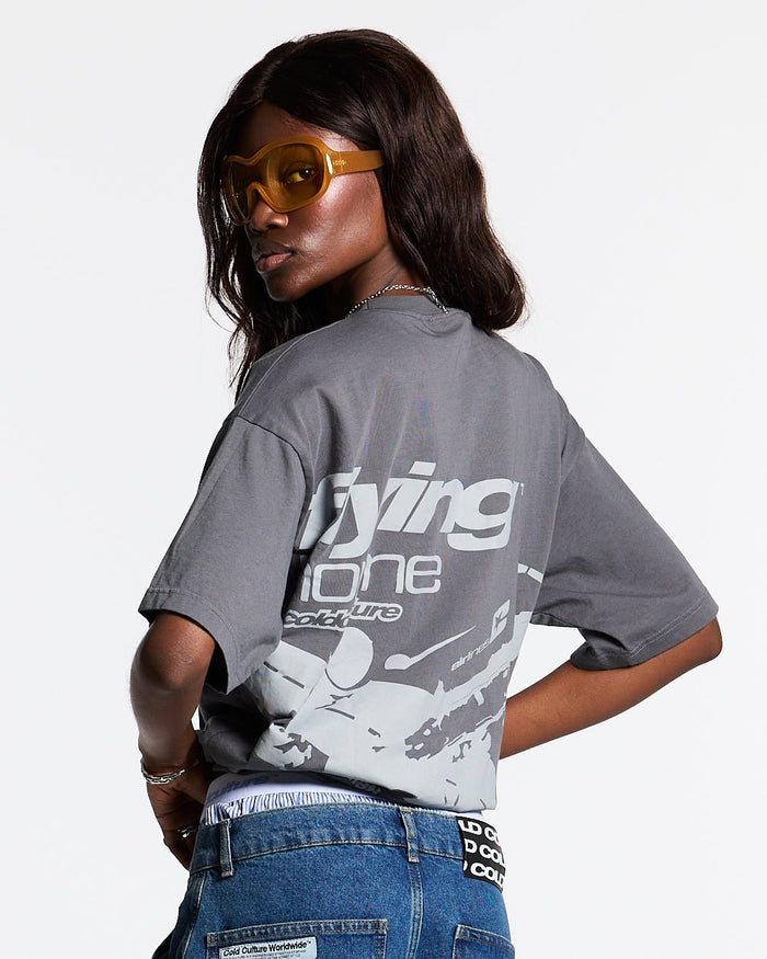 FLYING HOME TEE DOVE GREY - dove grey graphic print tee, back view on female model - Cold Culture #woman