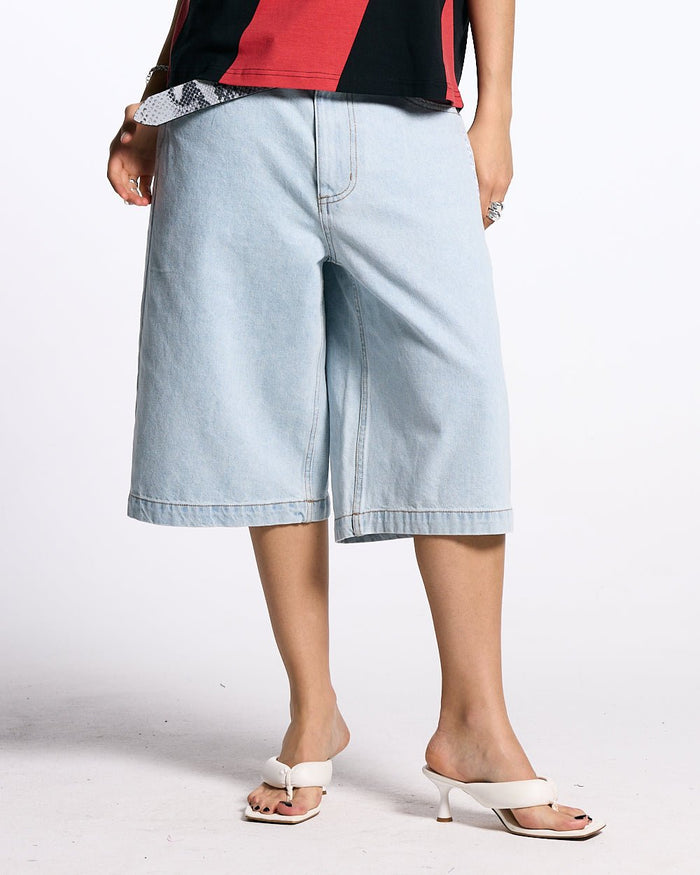 FROSTED JORTS LIGHT BLUE DENIM - light blue denim shorts, front view on female model - Cold Culture #woman