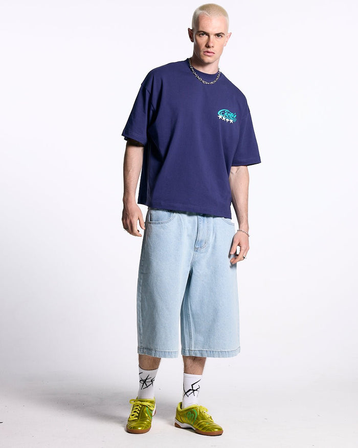 FROSTED JORTS LIGHT BLUE DENIM - light blue denim shorts, front view on male model - Cold Culture #man
