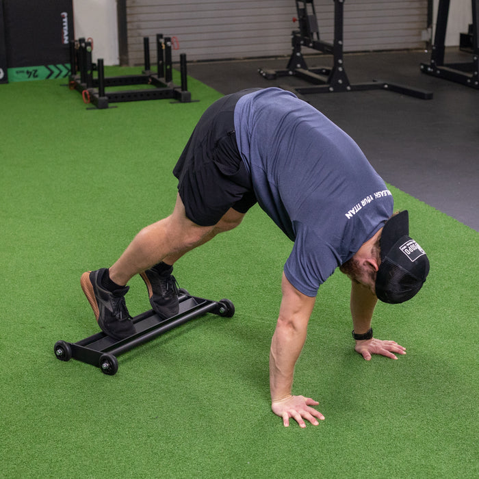 Glute Ham Glider - Smooth rolling wheels for an easy glide across the floor