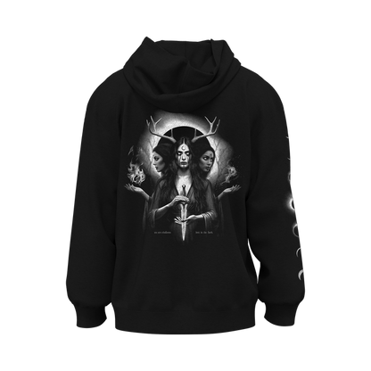 Kittie black heavyweight fleece hoodie featuring a mystical, three-faced goddess with antlers and dagger on the back, glowing symbols and smoke in her hands, halo behind her, and white sleeve designs.