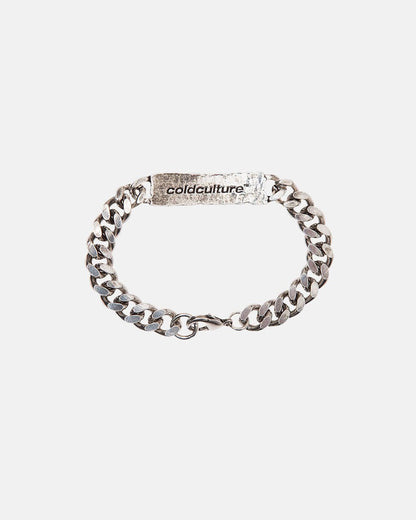ID BRACELET - silver curb chain ID bracelet, flat lay - Cold Culture