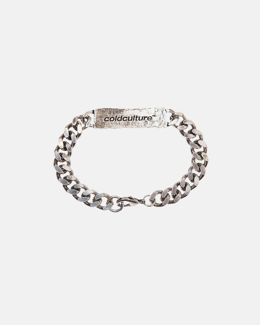 ID BRACELET - silver curb chain ID bracelet, flat lay - Cold Culture
