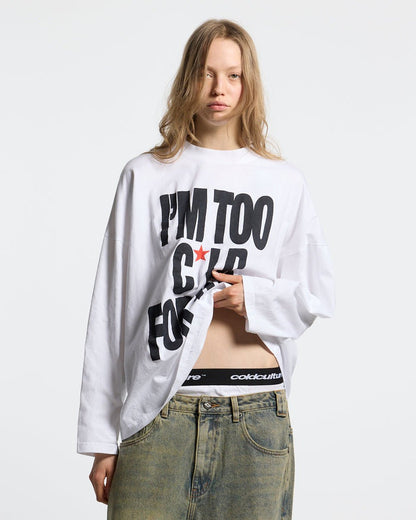 IM TOO COLD LONGSLEEVE TEE WHITE - white slogan print longsleeve tee, front view on female model - Cold Culture