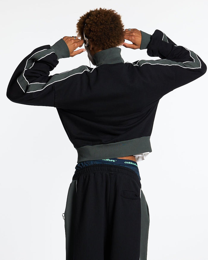 JET LAG JACKET BLACK - black and green zip-up hoodie, back view on male model - Cold Culture #man