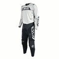 Motocross outfit with white top and black pants featuring 'CNVS' branding on a white background.