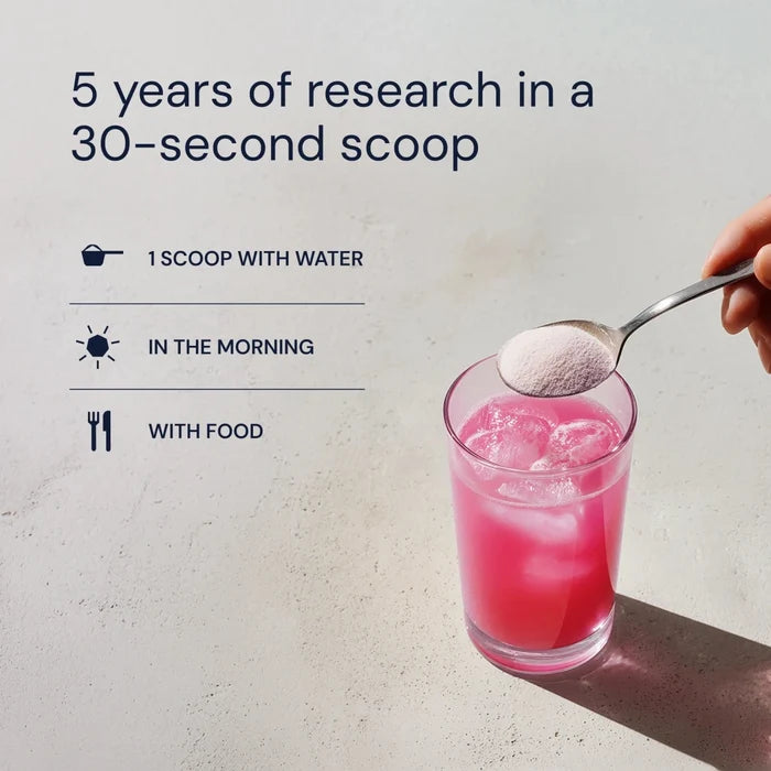 Spoon with pink powder over a glass of pink liquid, with text about product usage.
