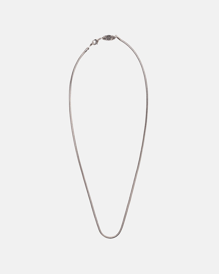 LOOP CHAIN - thin silver snake chain necklace, flat lay - Cold Culture