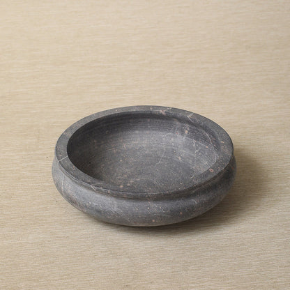 Low carved stone bowl
