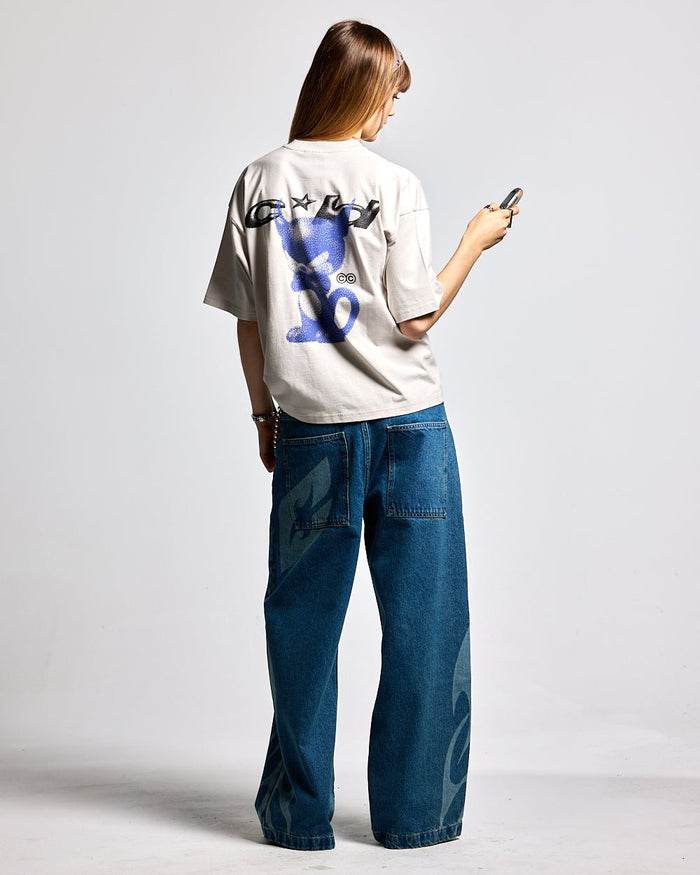 NEOTRIBAL V2 PANTS LIGHT BLUE DENIM - light blue tribal print denim pants, back view on female model - Cold Culture #woman