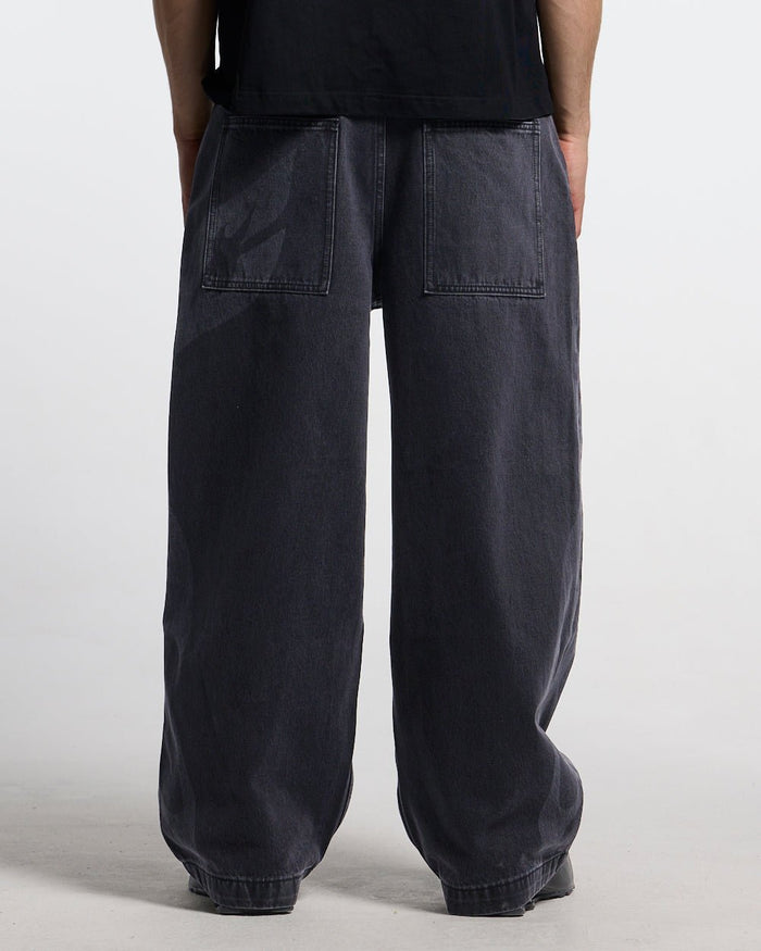 NEOTRIBAL V2 PANTS WASHED BLACK - washed black tribal print pants, back view on male model - Cold Culture #man